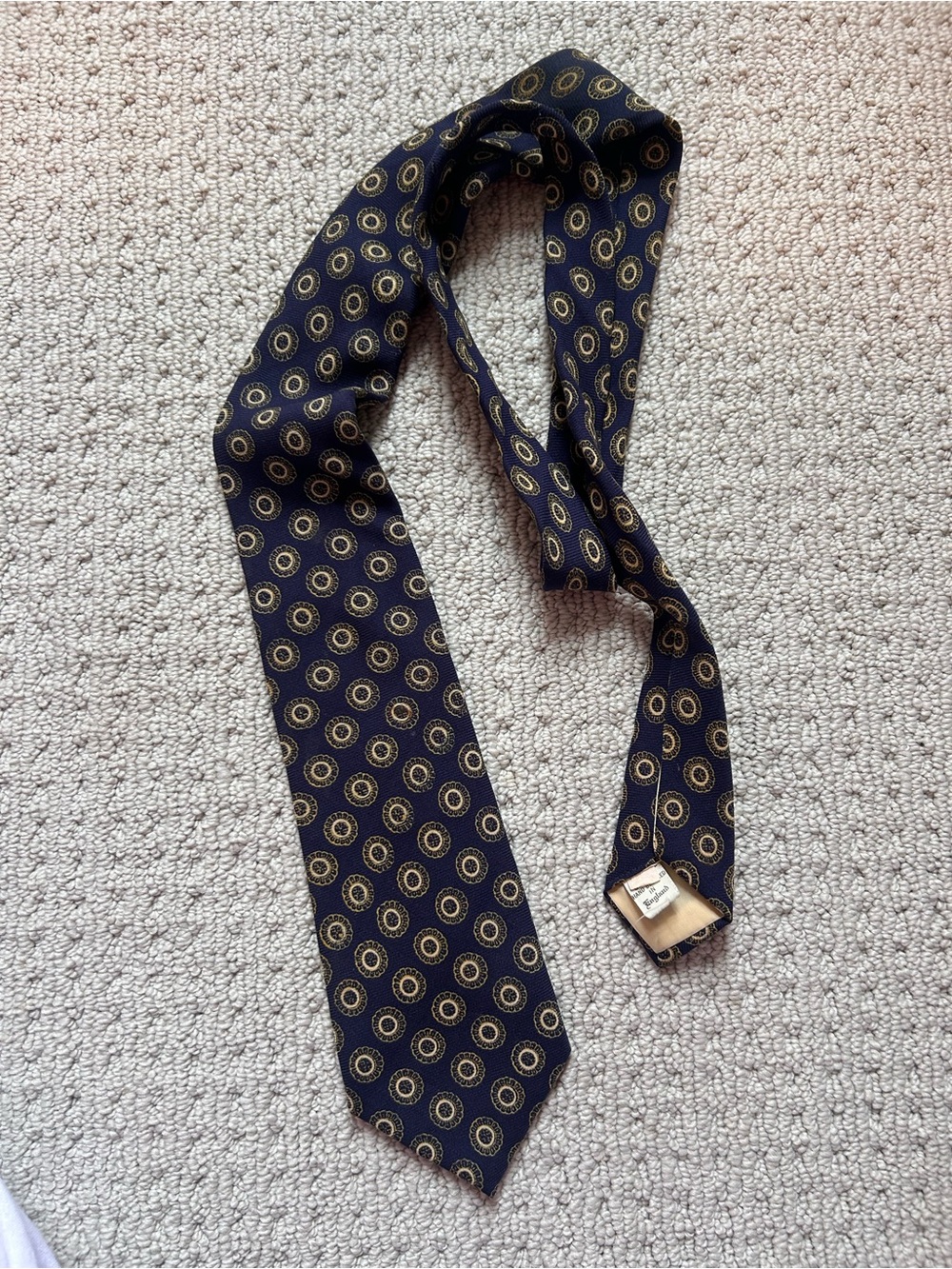 Classic Navy Tie with Gold Circular Motif